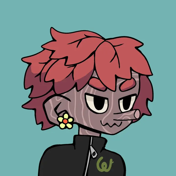 A red-haired Woodie in a black jacket